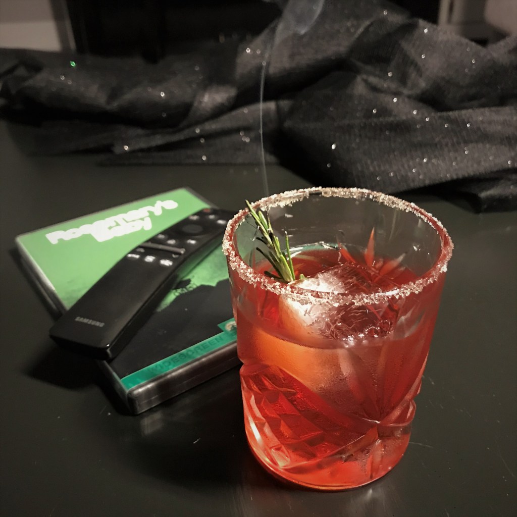 Smoke wafting from the rosemary affects every sip.